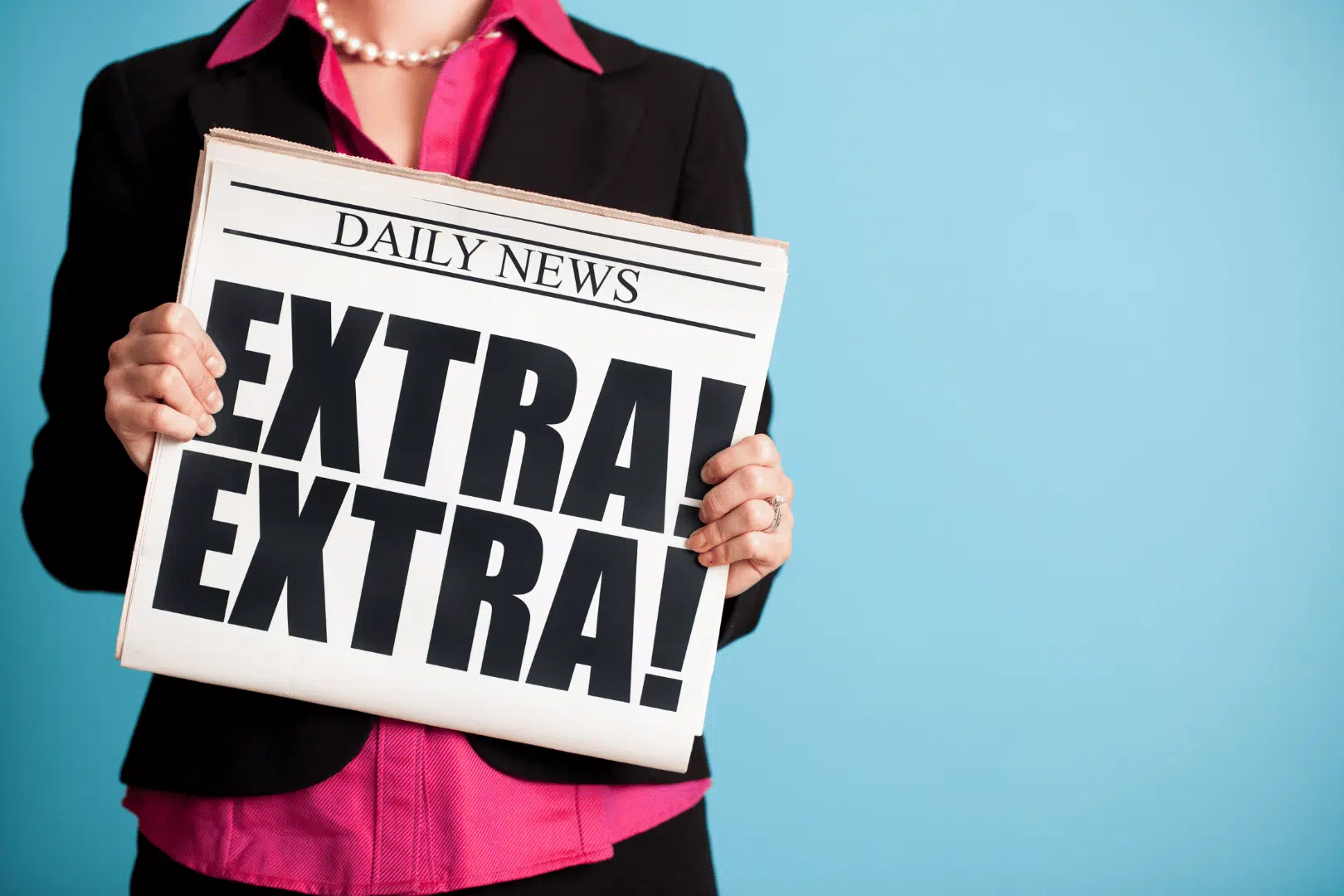 Limelight Blog Images picture of business woman holding a newspaper that says "Extra! Extra!"